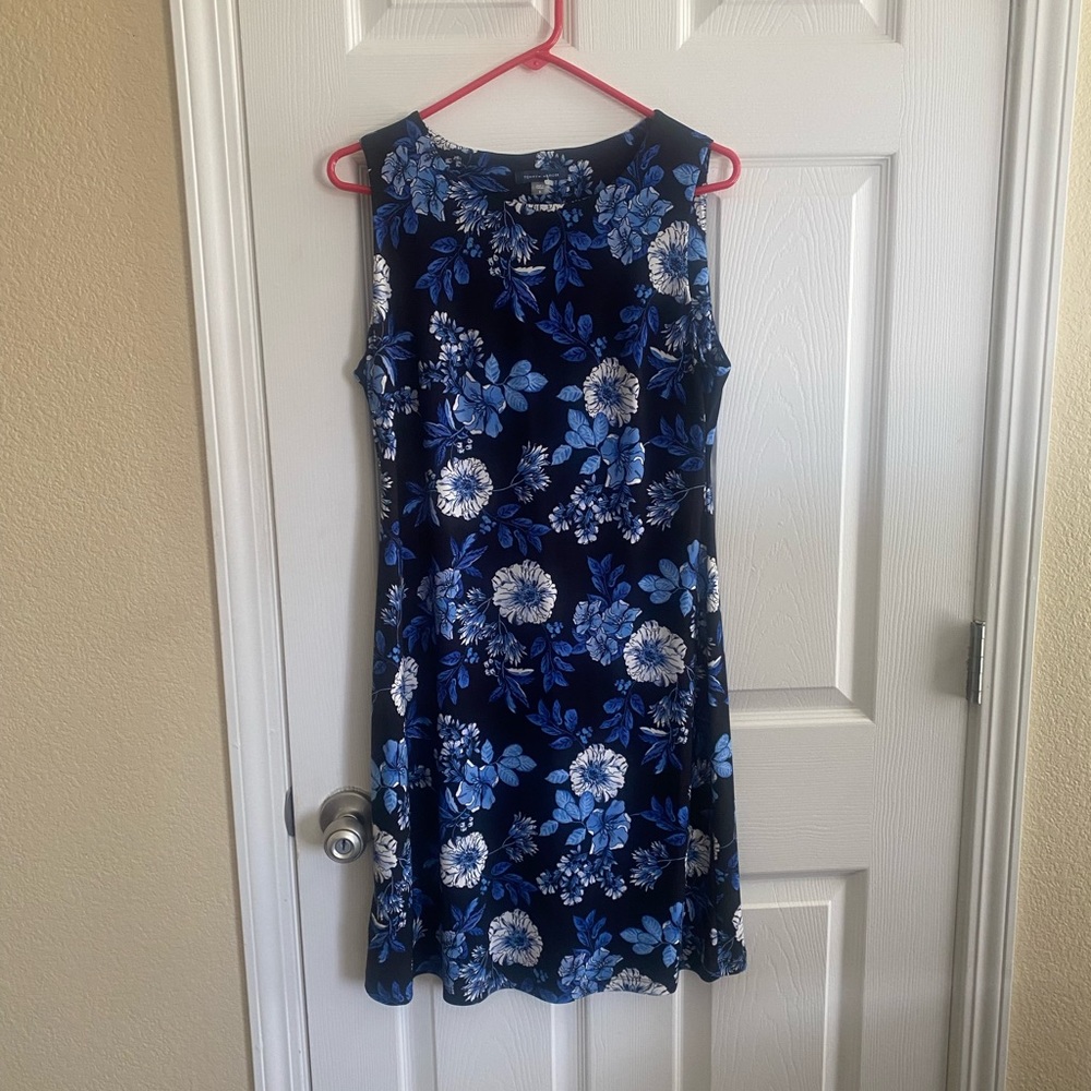 Beautiful floral summer dress below the knees.
